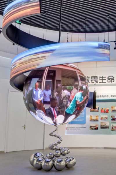 creative led sphere with spiral ribbon display art installation