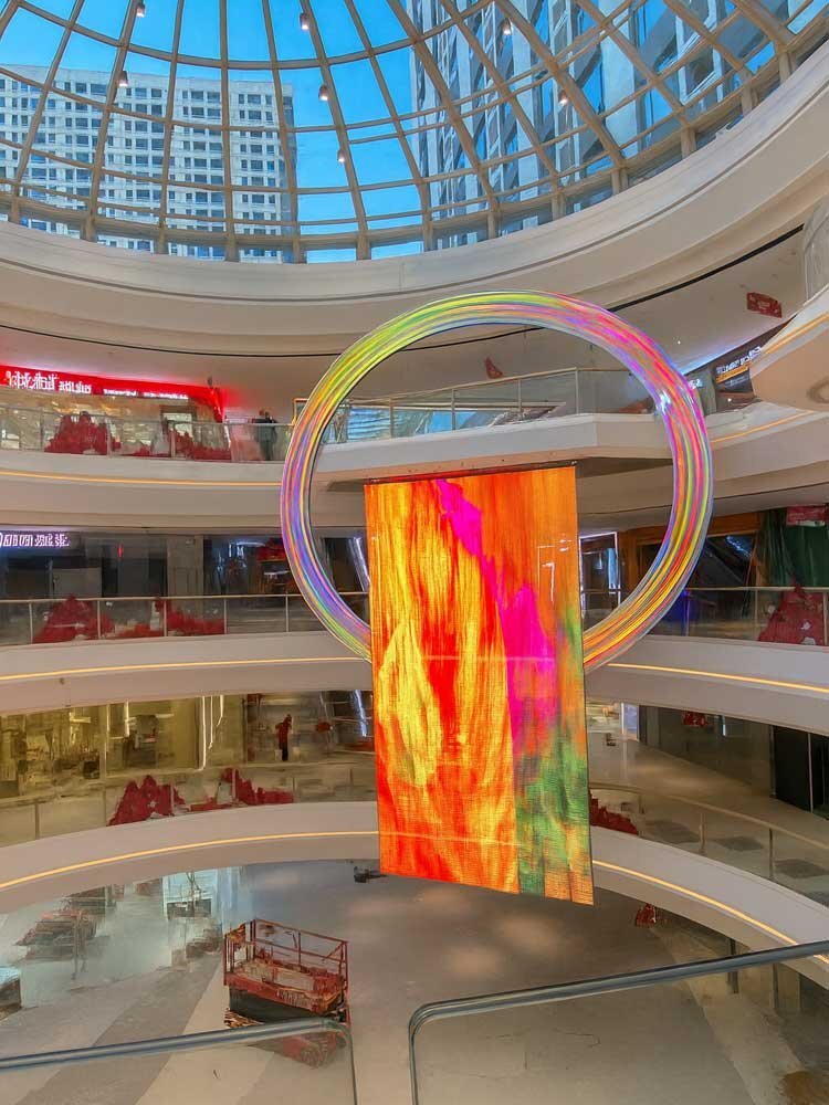 indoor transparent led screen – artistic display in a dome atrium