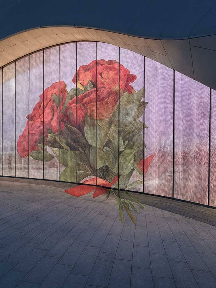 iconic transparent led glass facade with rose display